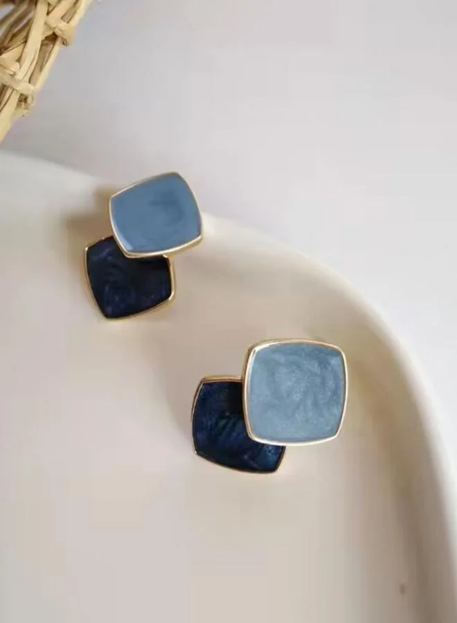 تايك تو أقراطة هندسية على شكل معين